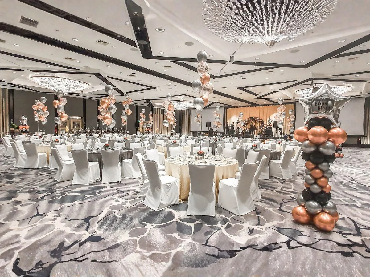 Corporate banquet table and centrepiece styling by The Happier Event Company